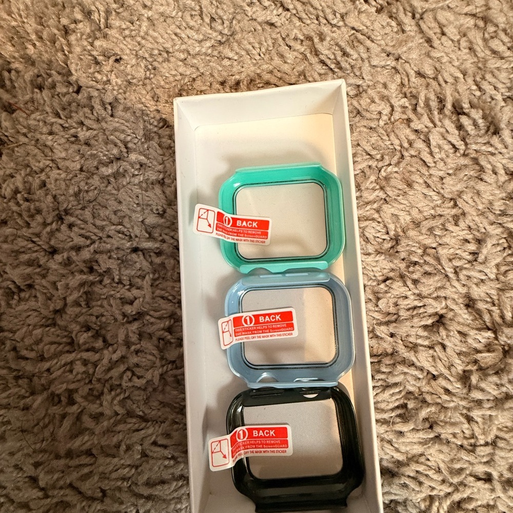 Set of Three Watch Bezels in Green, Blue, and Black